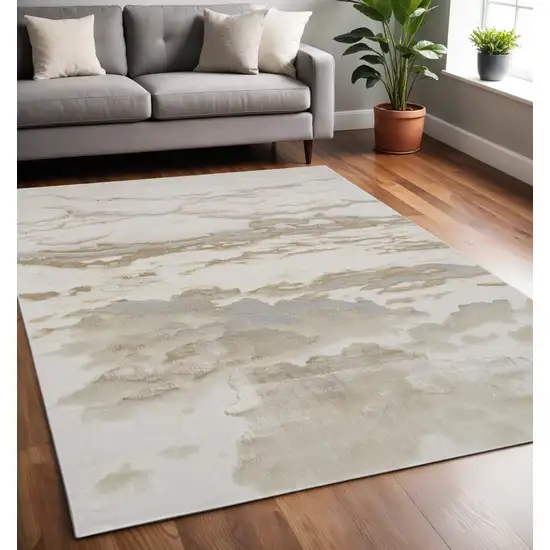 Brown And Ivory Abstract Area Rug Photo 1
