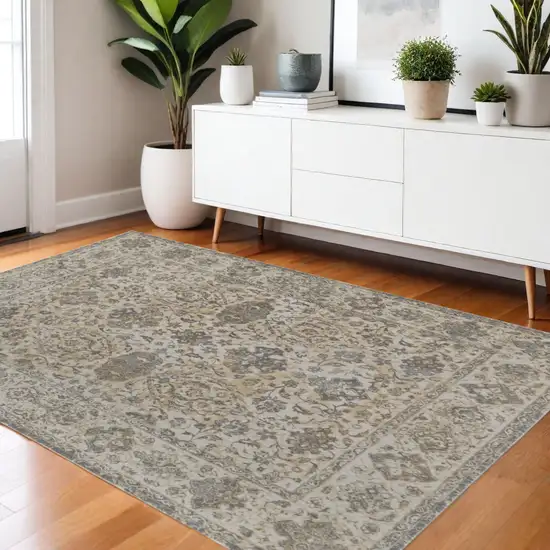 Gray Ivory And Tan Oriental Area Rug Photo 1