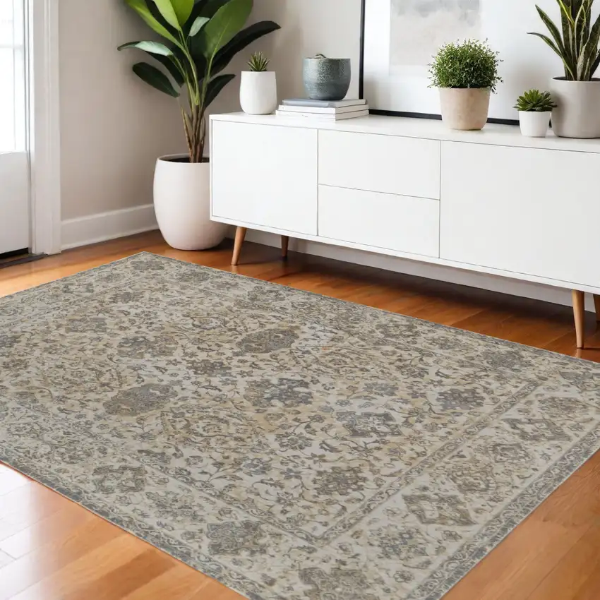 Gray Ivory And Tan Oriental Area Rug Photo 1