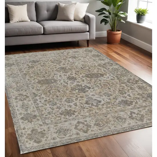 Gray Ivory And Tan Oriental Area Rug Photo 1