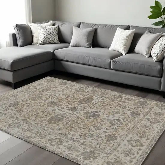 Gray Ivory And Tan Oriental Area Rug Photo 1