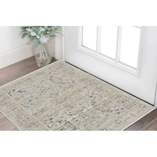 Ivory Tan And Light Blue Oriental Distressed Area Rug With Fringe Photo 1