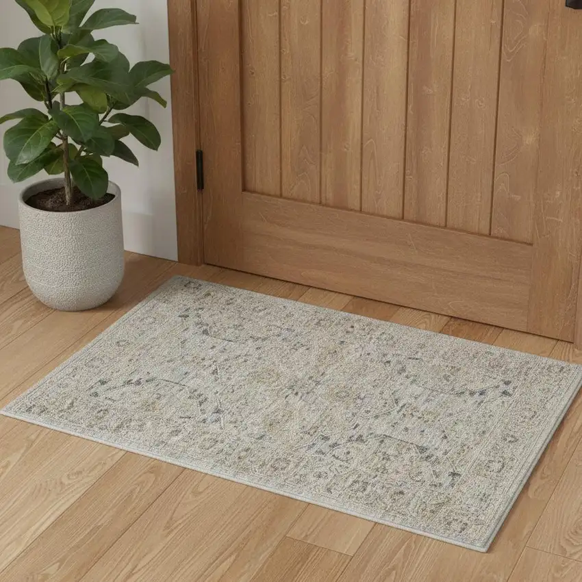 Ivory Tan And Light Blue Oriental Distressed Area Rug With Fringe Photo 1