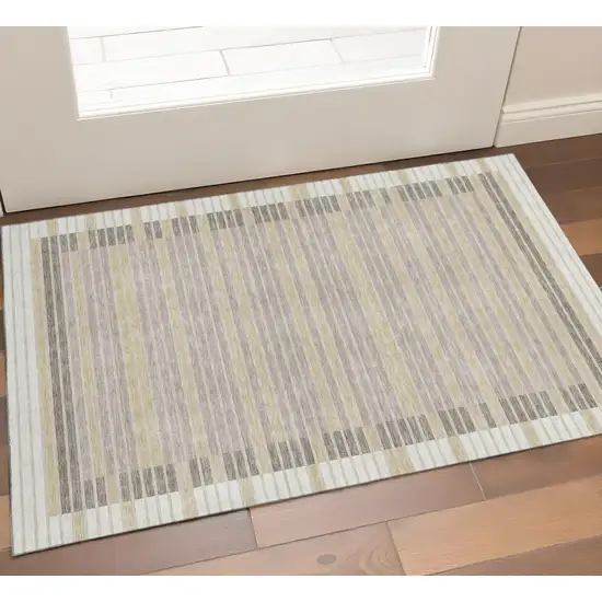 Ivory Tan And Taupe Striped Washable Area Rug With UV Protection Photo 1