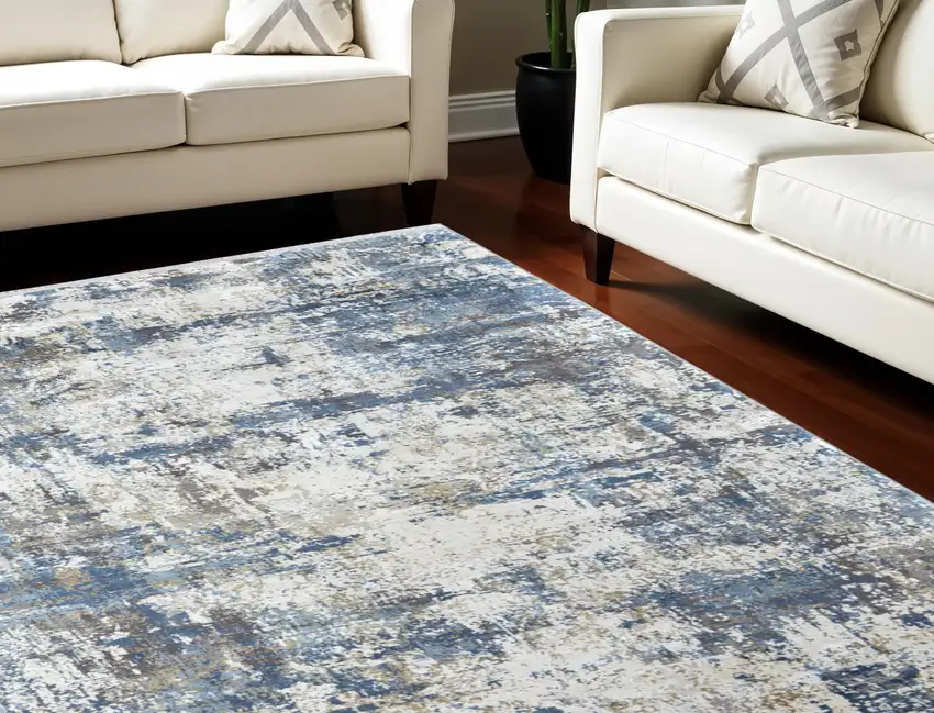 Ivory Tan and Blue Abstract Power Loom Area Rug With Fringe Photo 1