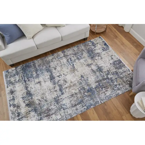 Ivory Tan and Blue Abstract Power Loom Area Rug With Fringe Photo 9