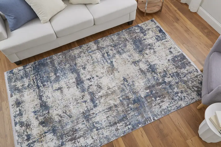 Ivory Tan and Blue Abstract Power Loom Area Rug With Fringe Photo 9