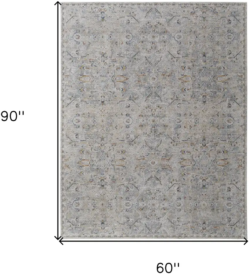 Ivory Tan and Blue Abstract Power Loom Worn Faded Area Rug With Fringe Photo 3