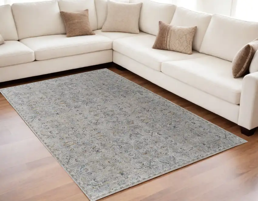 Ivory Tan and Blue Abstract Power Loom Worn Faded Area Rug With Fringe Photo 1