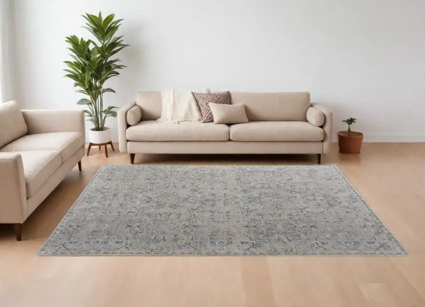 Ivory Tan and Blue Abstract Power Loom Worn Faded Area Rug With Fringe Photo 1