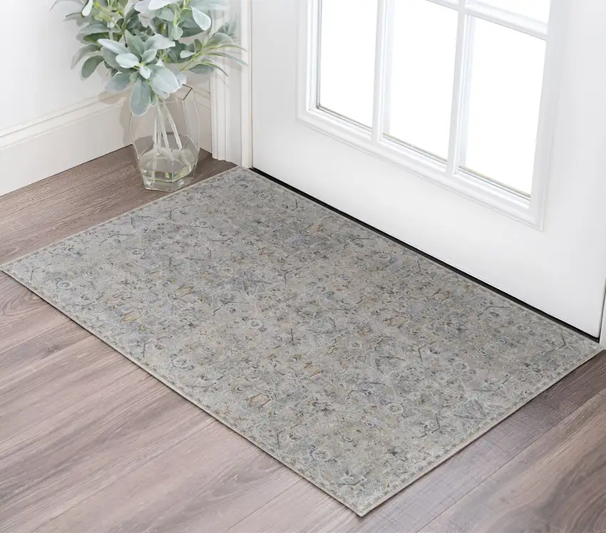 Ivory Tan and Blue Abstract Power Loom Worn Faded Area Rug With Fringe Photo 1
