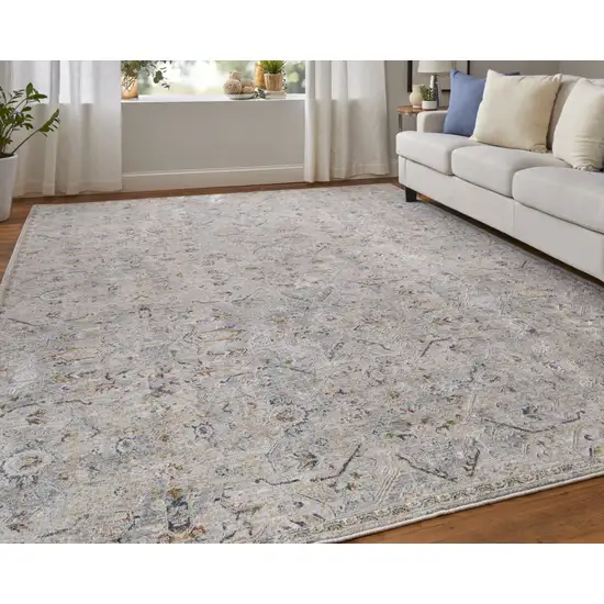 Ivory Tan and Blue Abstract Power Loom Worn Faded Area Rug With Fringe Photo 9