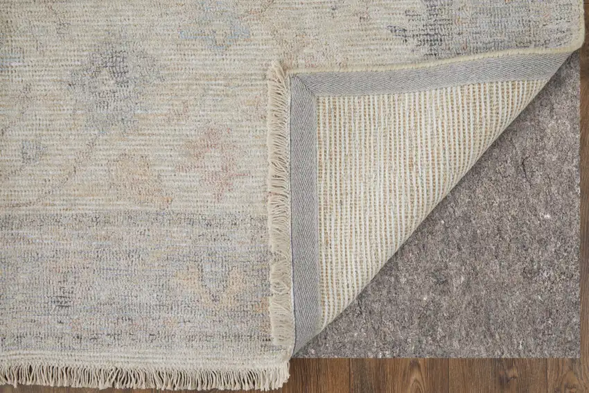 Ivory Tan and Blue Floral Hand Woven Distressed Area Rug With Fringe Photo 8