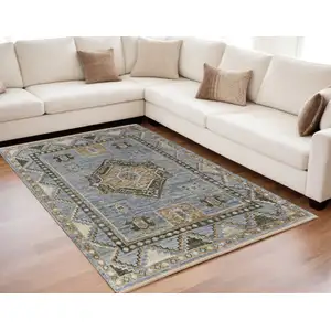 Photo of Ivory Tan and Blue Wool Oriental Hand Knotted Area Rug With Fringe