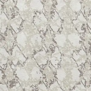 Photo of Ivory Taupe And Beige Abstract Washable Area Rug With UV Protection