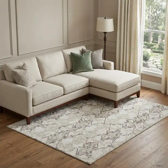 Ivory Taupe And Beige Abstract Washable Area Rug With UV Protection Photo 1