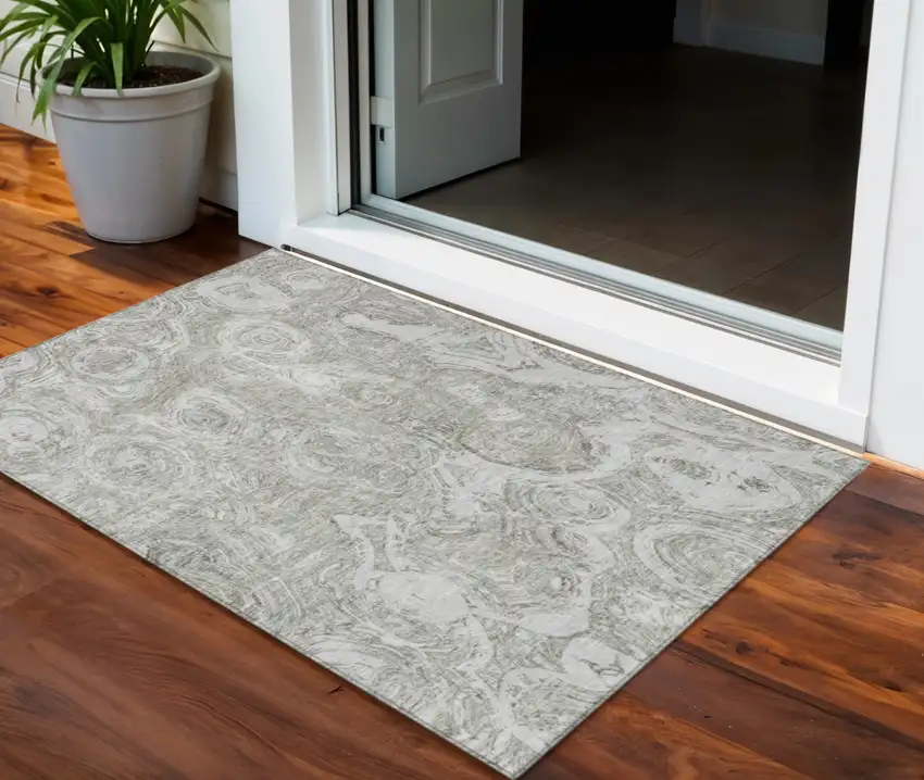 Ivory Taupe And Beige Abstract Washable Indoor Outdoor Area Rug Photo 1