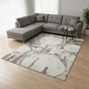 Photo of Ivory Taupe And Beige Geometric Washable Area Rug With UV Protection