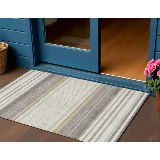 Ivory Taupe And Beige Striped Washable Indoor Outdoor Area Rug Photo 1