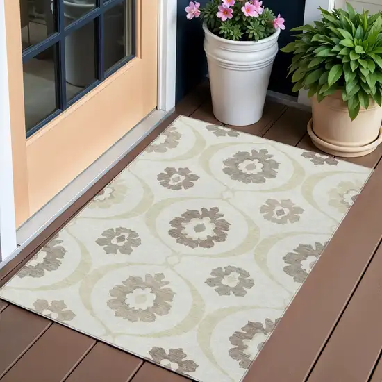 Ivory Taupe And Brown Medallion Washable Indoor Outdoor Area Rug Photo 1