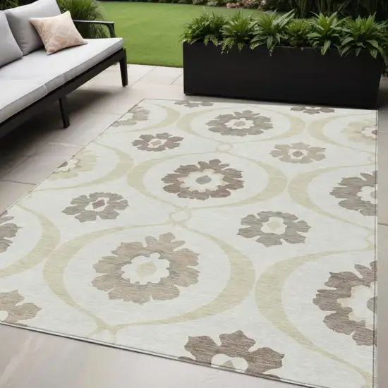 Ivory Taupe And Brown Medallion Washable Indoor Outdoor Area Rug Photo 1