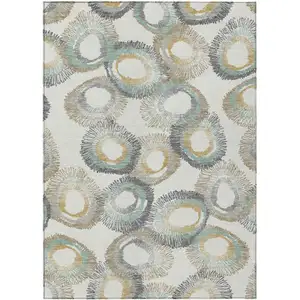 Photo of Ivory Taupe And Gold Geometric Washable Indoor Outdoor Area Rug