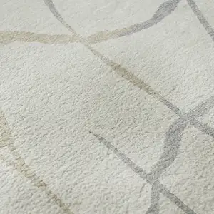 Photo of Ivory Taupe And Gray Abstract Geometric Washable Area Rug With UV Protection