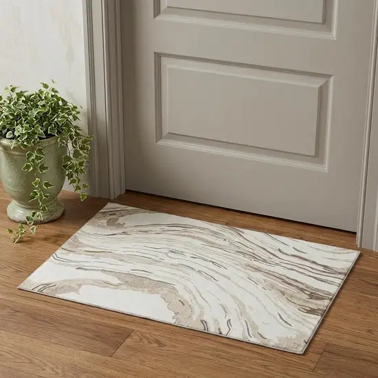 Ivory Taupe And Gray Abstract Washable Area Rug With UV Protection Photo 1