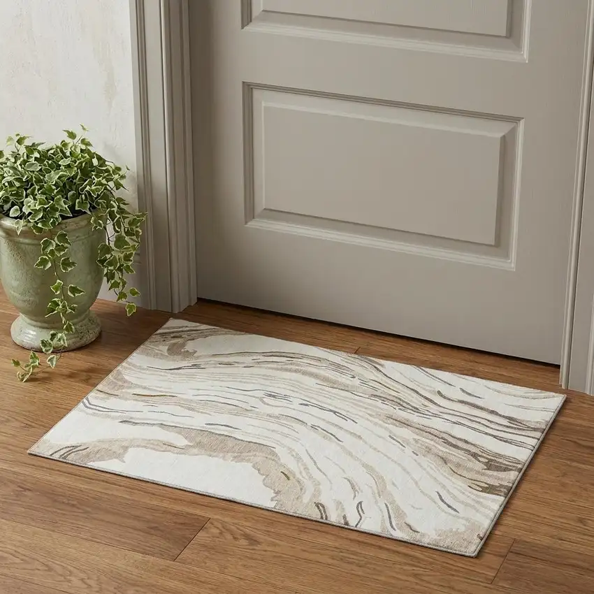 Ivory Taupe And Gray Abstract Washable Area Rug With UV Protection Photo 1