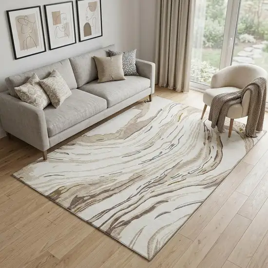Ivory Taupe And Gray Abstract Washable Area Rug With UV Protection Photo 1