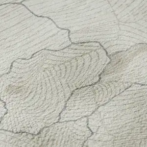 Photo of Ivory Taupe And Gray Abstract Washable Area Rug With UV Protection