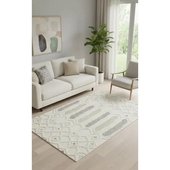 Ivory Taupe And Tan Wool Geometric Tufted Handmade Stain Resistant Area Rug Photo 1