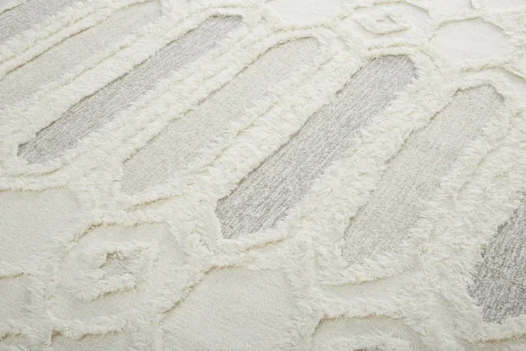 Ivory Taupe And Tan Wool Geometric Tufted Handmade Stain Resistant Area Rug Photo 1