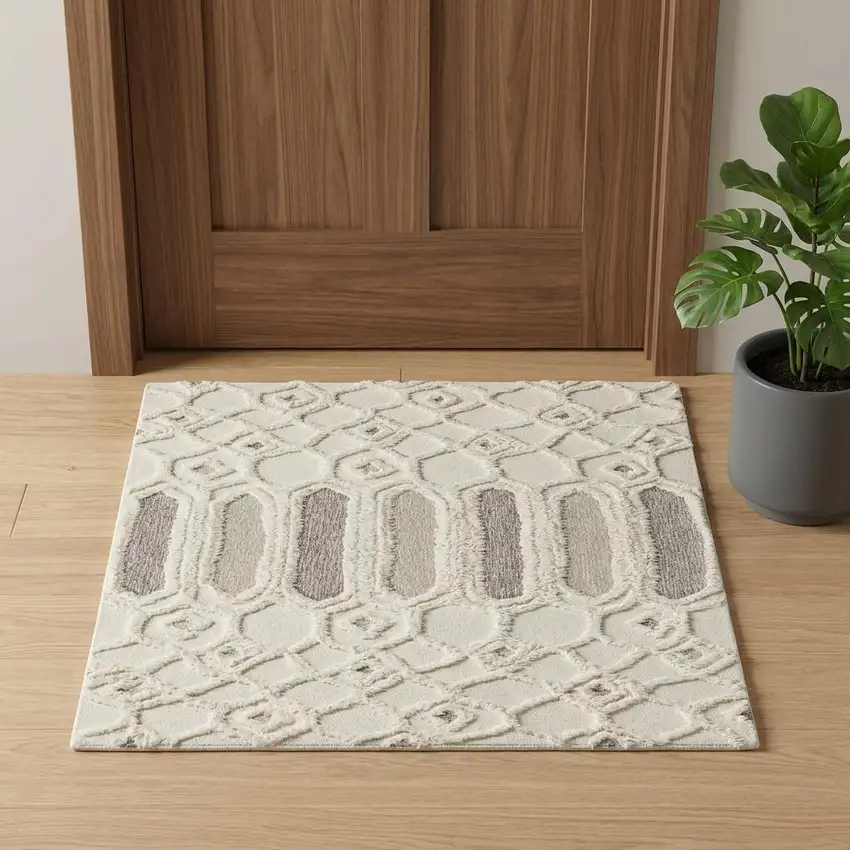 Ivory Taupe And Tan Wool Geometric Tufted Handmade Stain Resistant Area Rug Photo 1