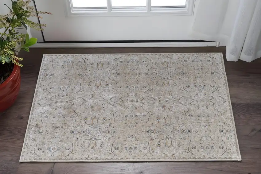 Ivory Taupe and Blue Abstract Power Loom Worn Faded Area Rug With Fringe Photo 1