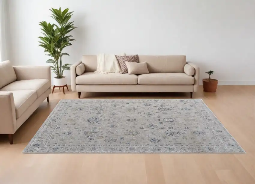 Ivory Taupe and Blue Floral Power Loom Worn Faded Area Rug With Fringe Photo 1