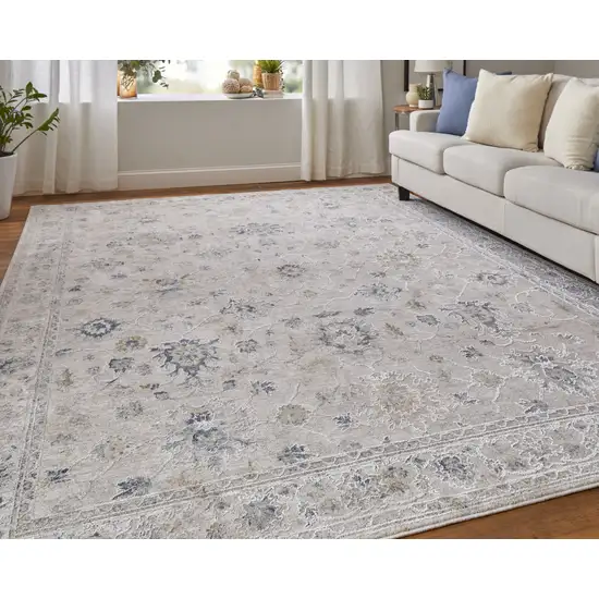 Ivory Taupe and Blue Floral Power Loom Worn Faded Area Rug With Fringe Photo 8