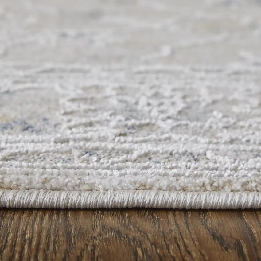 Ivory Taupe and Blue Floral Power Loom Worn Faded Area Rug With Fringe Photo 9