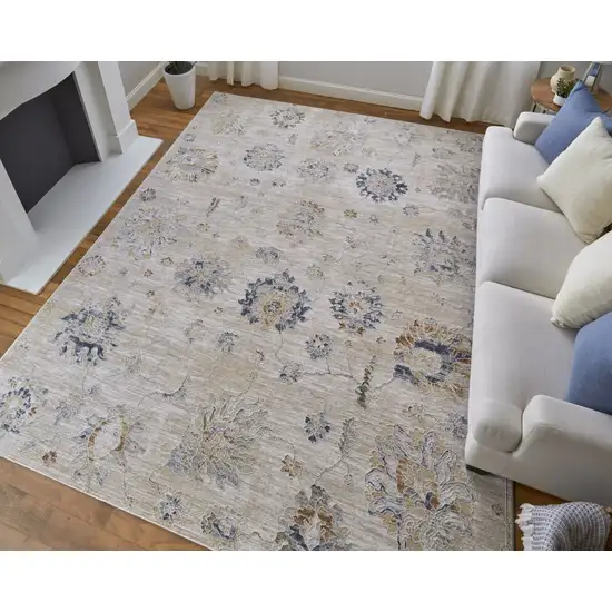 Ivory Taupe and Blue Floral Power Loom Worn Faded Area Rug With Fringe Photo 9