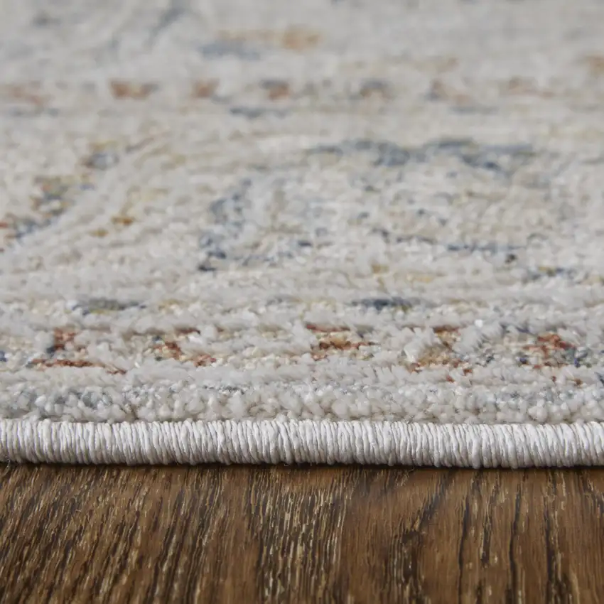 Ivory Taupe and Blue Ikat Power Loom Worn Faded Area Rug With Fringe Photo 8