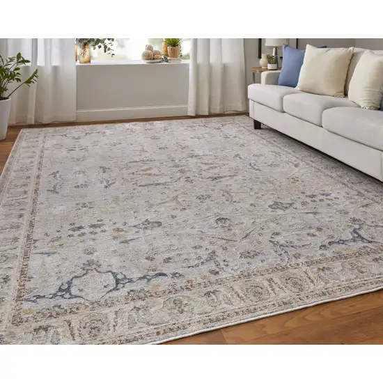 Ivory Taupe and Blue Ikat Power Loom Worn Faded Area Rug With Fringe Photo 9