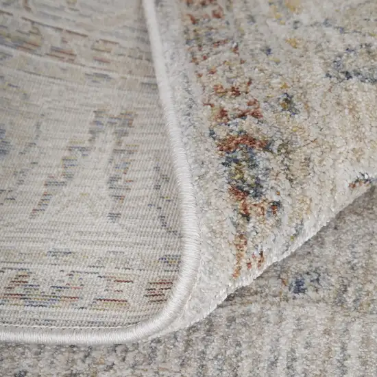 Ivory Taupe and Blue Ikat Power Loom Worn Faded Area Rug With Fringe Photo 5