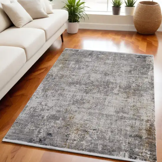 Ivory Taupe and Gray Abstract Power Loom Distressed Area Rug With Fringe Photo 1