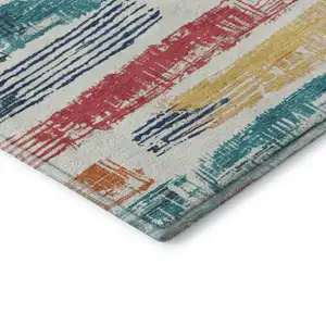 Photo of Ivory Teal And Orange Striped Washable Area Rug With UV Protection