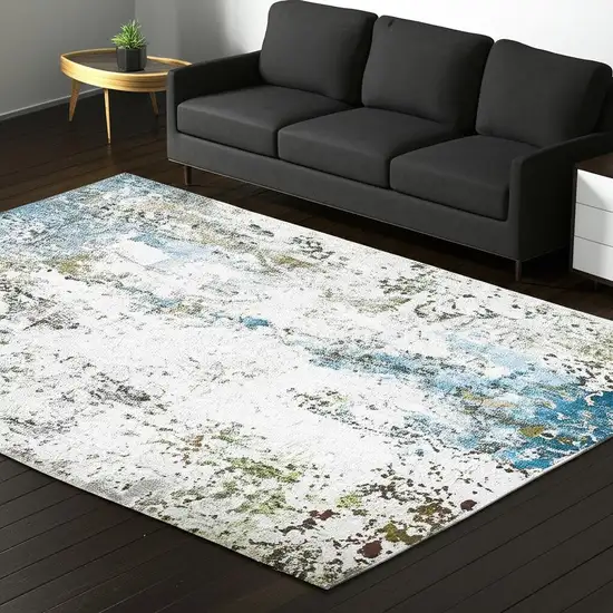 Ivory Teal Blue Grey Brown And Gold Abstract Printed Stain Resistant Non Skid Area Rug Photo 1