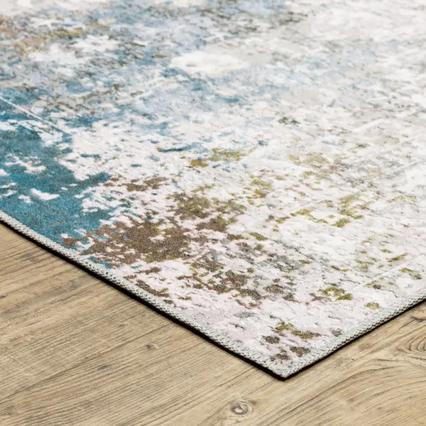 Ivory Teal Blue Grey Brown And Gold Abstract Printed Stain Resistant Non Skid Area Rug Photo 4