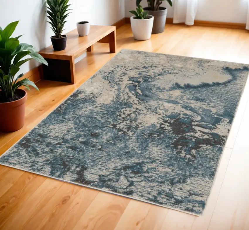 Ivory Teal Blue and Black Abstract Area Rug Photo 1