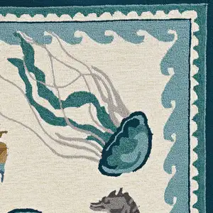 Photo of Ivory Teal Hand Hooked UV Treated Bordered Coastal Sea Life Indoor Outdoor Accent Rug