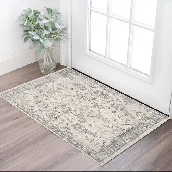 Ivory Floral Distressed Area Rug Photo 1