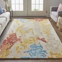 Photo of Ivory Yellow And Blue Wool Abstract Tufted Handmade Stain Resistant Area Rug